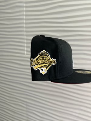 Image of Black Atlanta Braves Fitted Hats