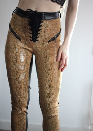 Image of SAMPLE SALE - THE PILGRIM GOLD SNAKE PRINT AND LEATHER PANTS (Size S)