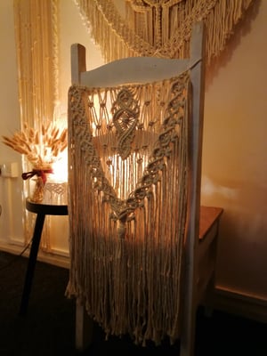 Macrame intricate wedding chair back 