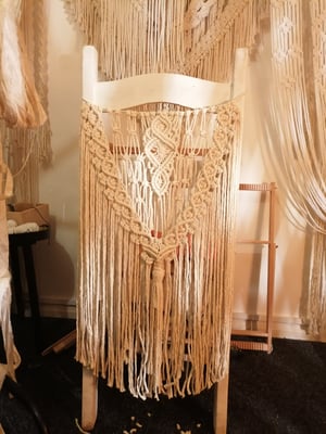 Macrame intricate wedding chair back 