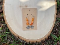 Image 1 of Orange Beaded Butterfly Dangle Earrings