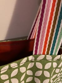 Image 2 of Green and white graphic print tote bag with burnt orange lining