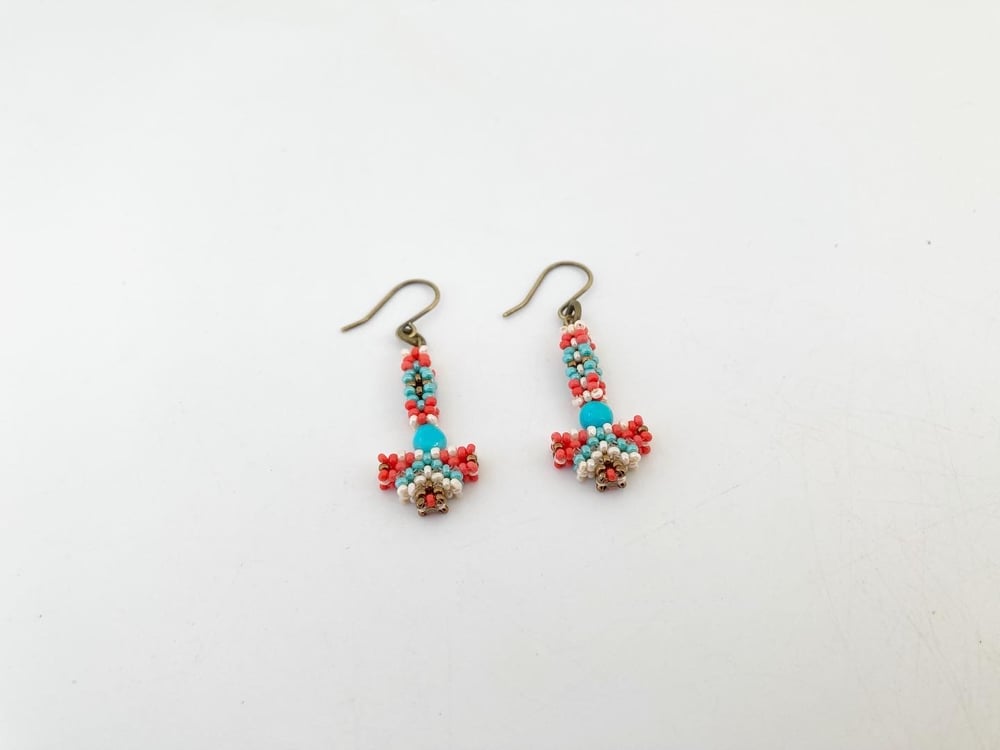 Image of Coral tone micro geometric earrings 