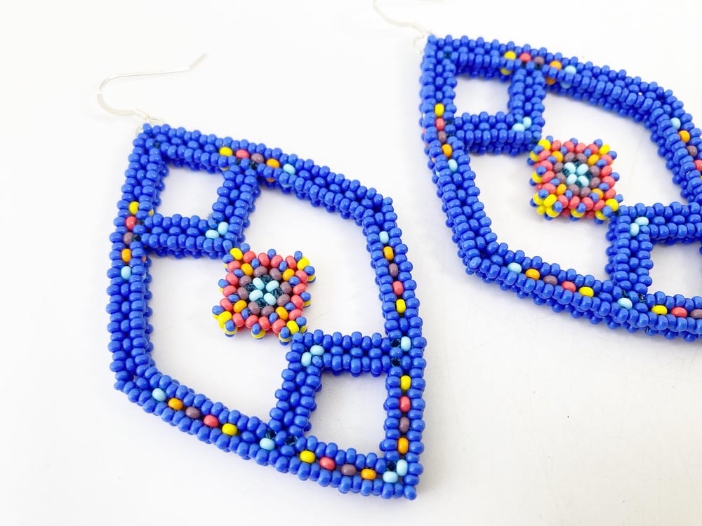 Image of Cobalt blue beaded spinal shape earrings 