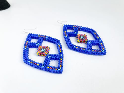 Image of Cobalt blue beaded spinal shape earrings 