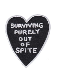 Image of spite sketchbook note iron on patch