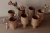 Upside down sweet chestnut bud vase