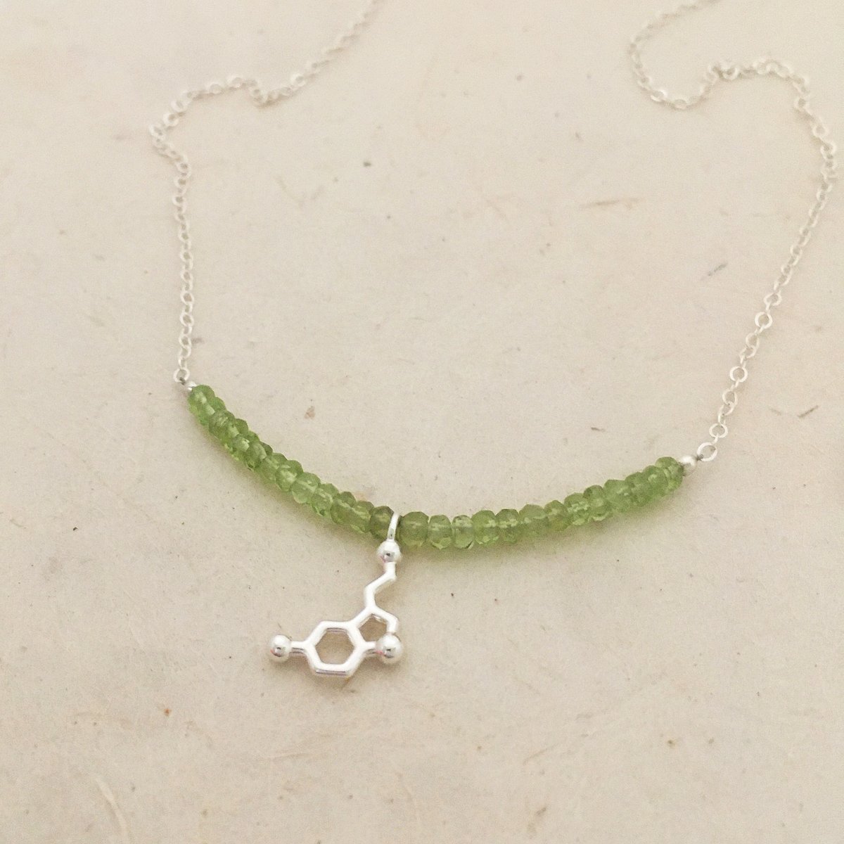 Image of tiny gemstone necklace