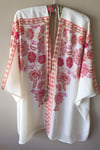 bohemian cochella coral and pink floral wide sleevs cape