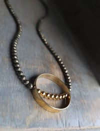 Image 4 of Minimalist Gold Vermeil Large Circle Pendant and Faceted Golden Pyrite Beaded Necklace