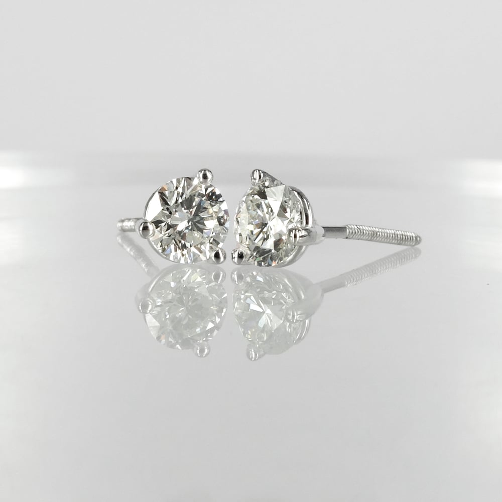 Image of 14K white gold diamond studs set with 2 diamonds = 1.53CT FSI2 total weight. Pj5861