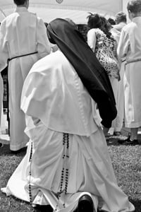 Nun praying 