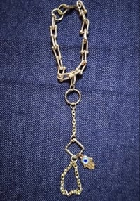 Image 1 of Gold plated slave bracelet with hand charm