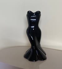 Image 1 of glossy black dress