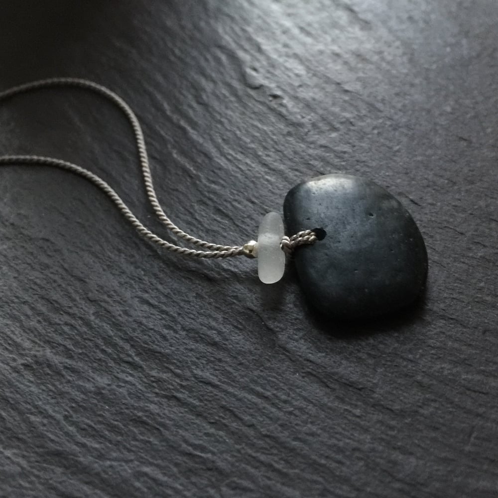 Image of Black stone with white sea glass - Devon