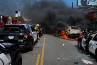 Los Angeles Riots - Police cars set on fire 