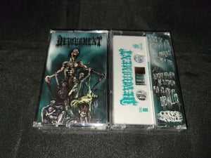 Image of 2021 Butcher The Weak cassette reissue / white with green print. Limited to 75