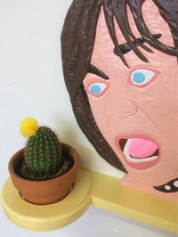 Image 2 of Iggy Pop yells at a plant