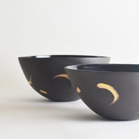 Image 1 of black and gold deep serving bowl