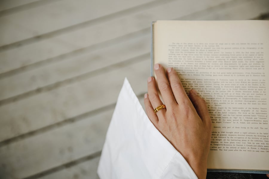 Image of gold plated silver hexagon ring with inscription in Latin