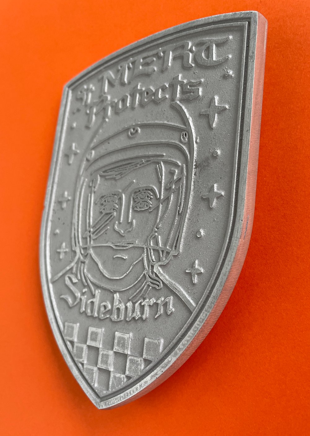 Image of St Mert Protects Shield
