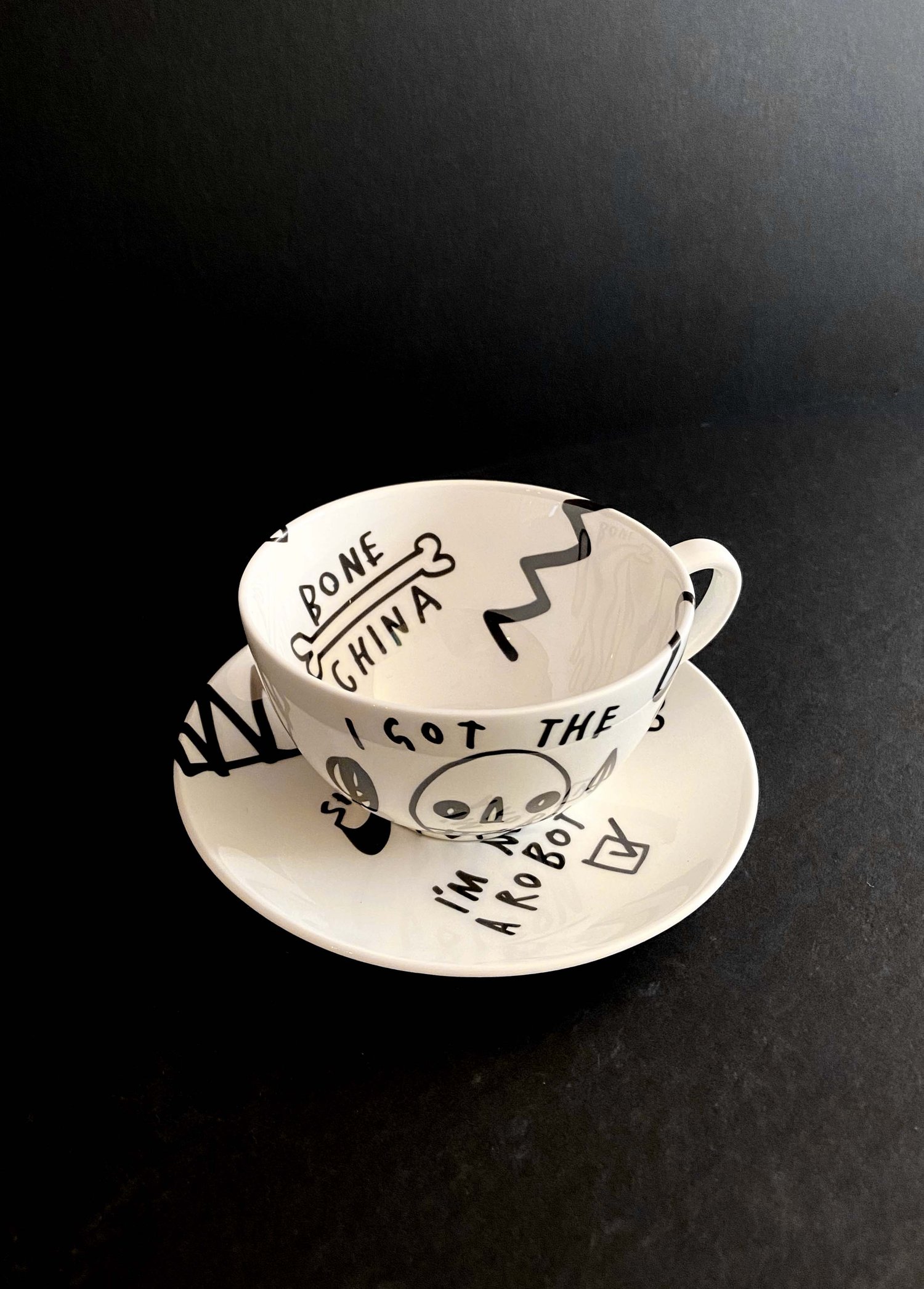 Image of ‘Bone China Series' Cup & saucer  by Skeleton Cardboard