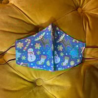 Image 1 of Blue mask with snowman, reindeer, ginger breadman.  