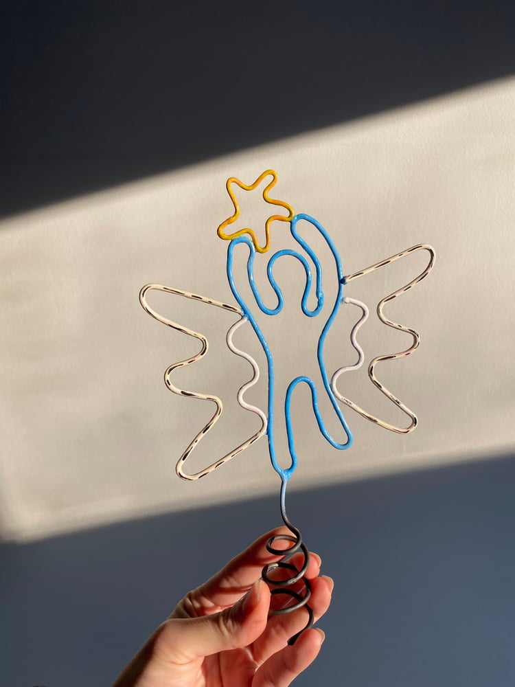 Image of Blue Star Chaser Tree Topper