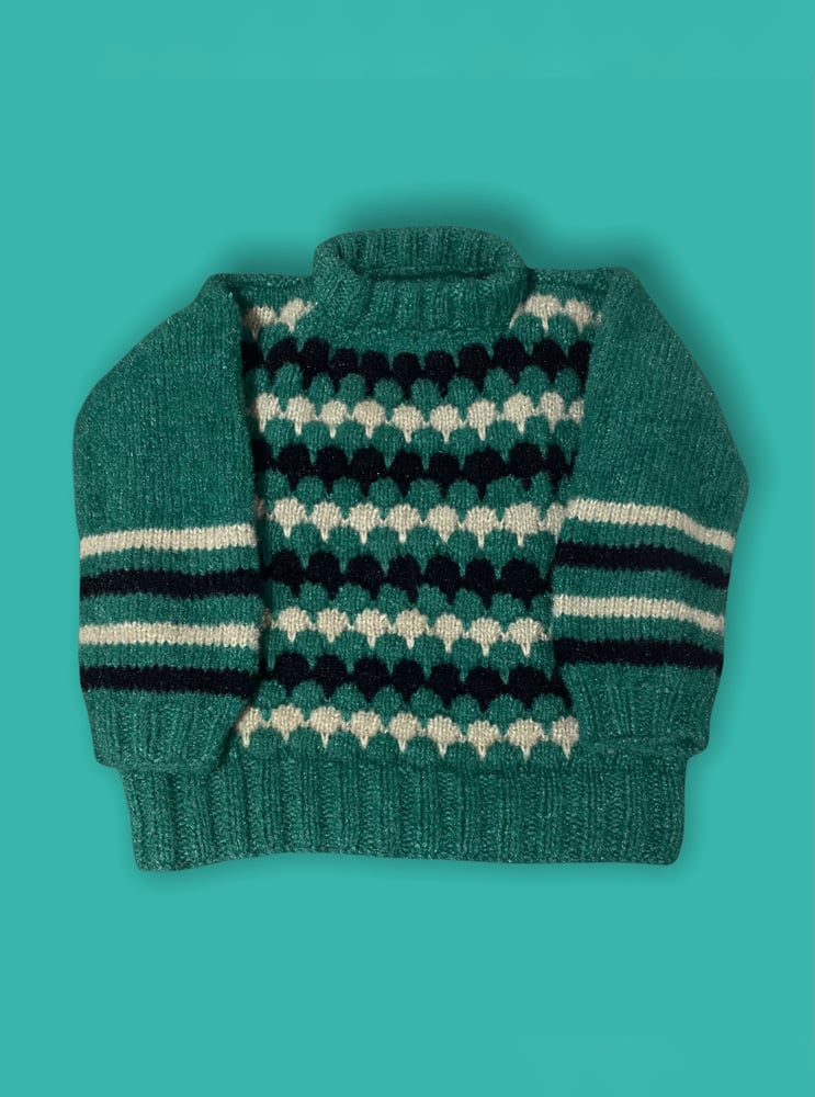 Image of Green crewneck pull over with black and white pattern