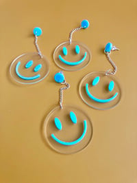 Image 3 of CLEAR SMILEY EARRINGS 