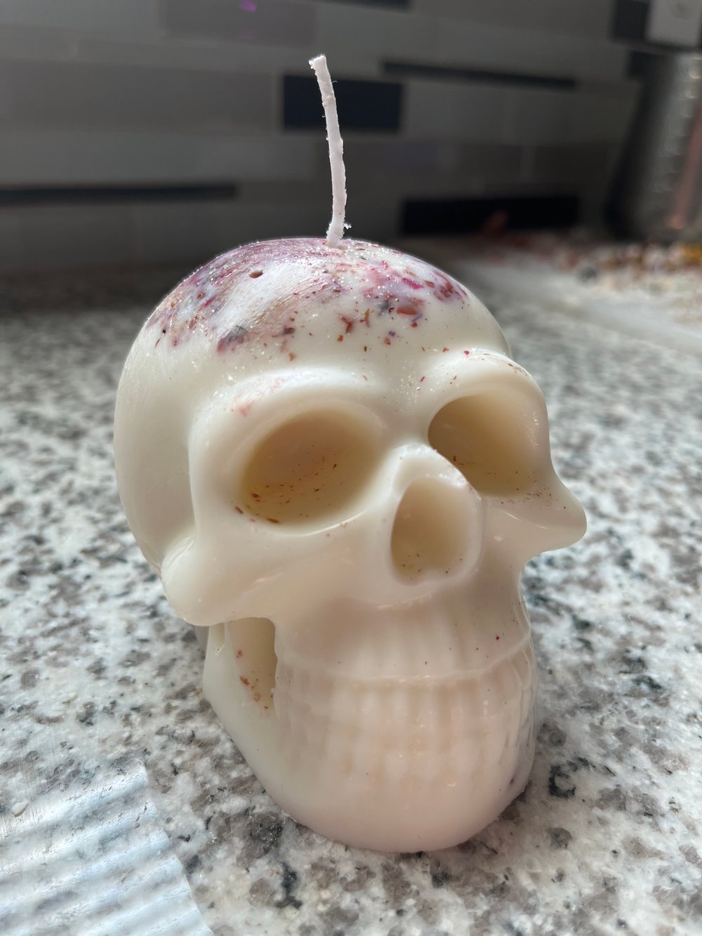 Himalayan salt and rose petal skull candle