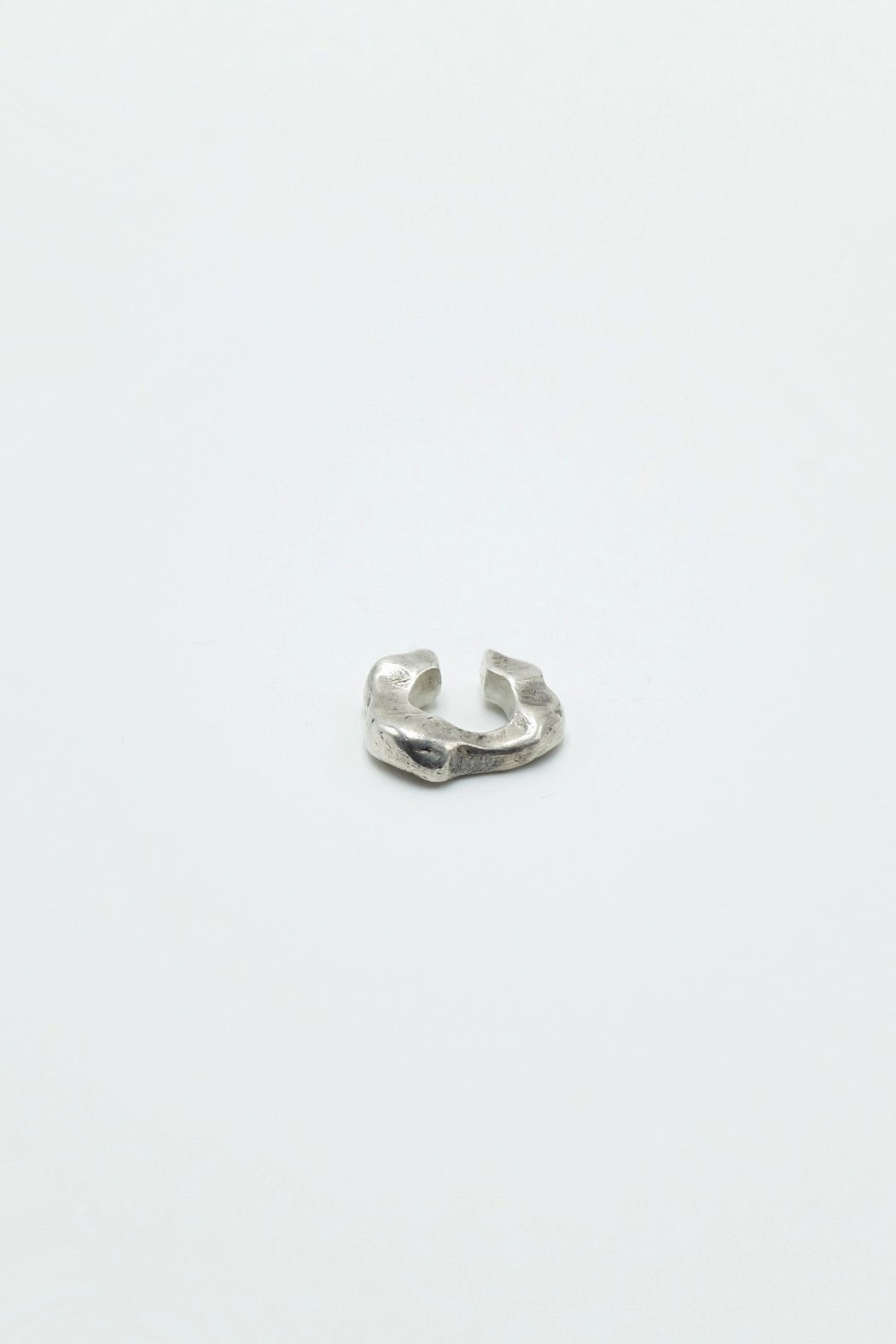 fossil ear cuff