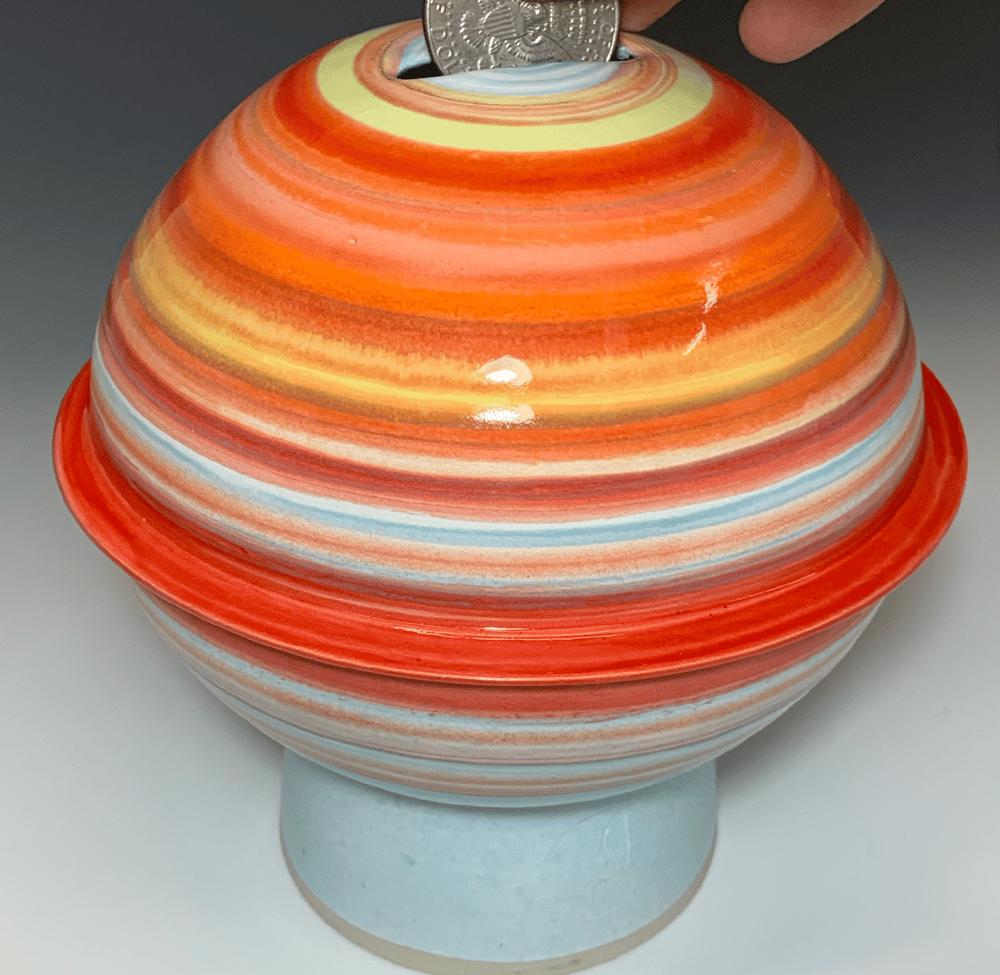 Image of Red Orbit Coin Jar