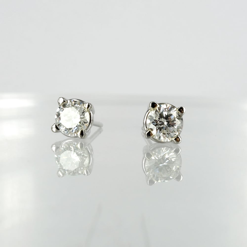 Image of 14ct white gold diamond stud earrings, set with 2 diamonds = .60ct GSI3. Pj6010