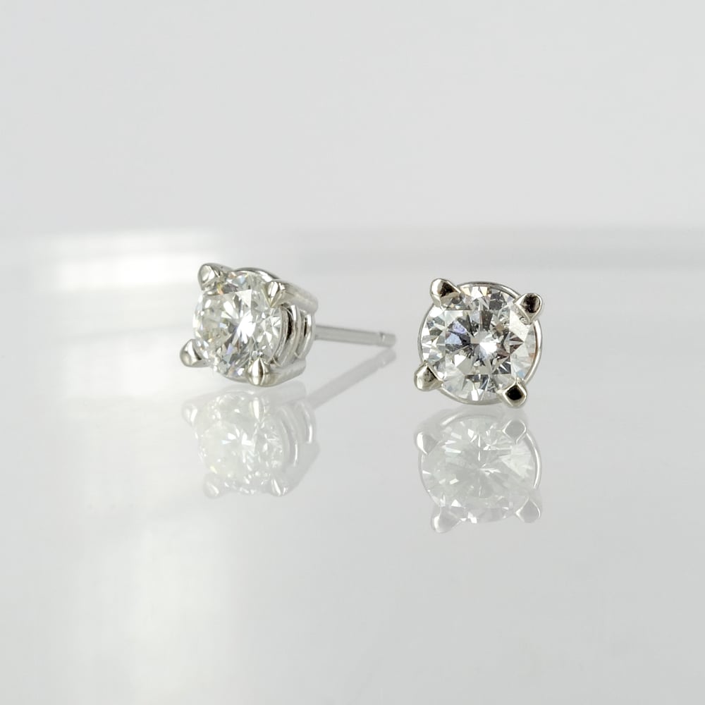Image of 14ct white gold diamond stud earrings, set with 2 diamonds = .60ct GSI3. Pj6010