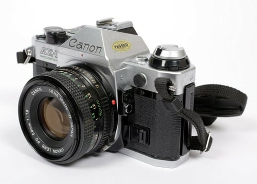 Image of CANON AE-1 Program 35mm SLR Film Camera with FDn 50mm F1.8 Lens