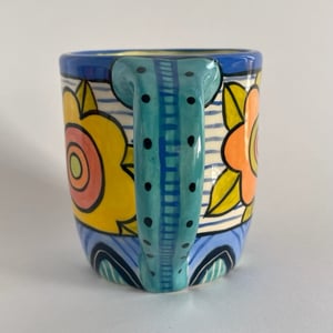 Image of 104 Mod Flowers and Stripes with Blue Border Mug