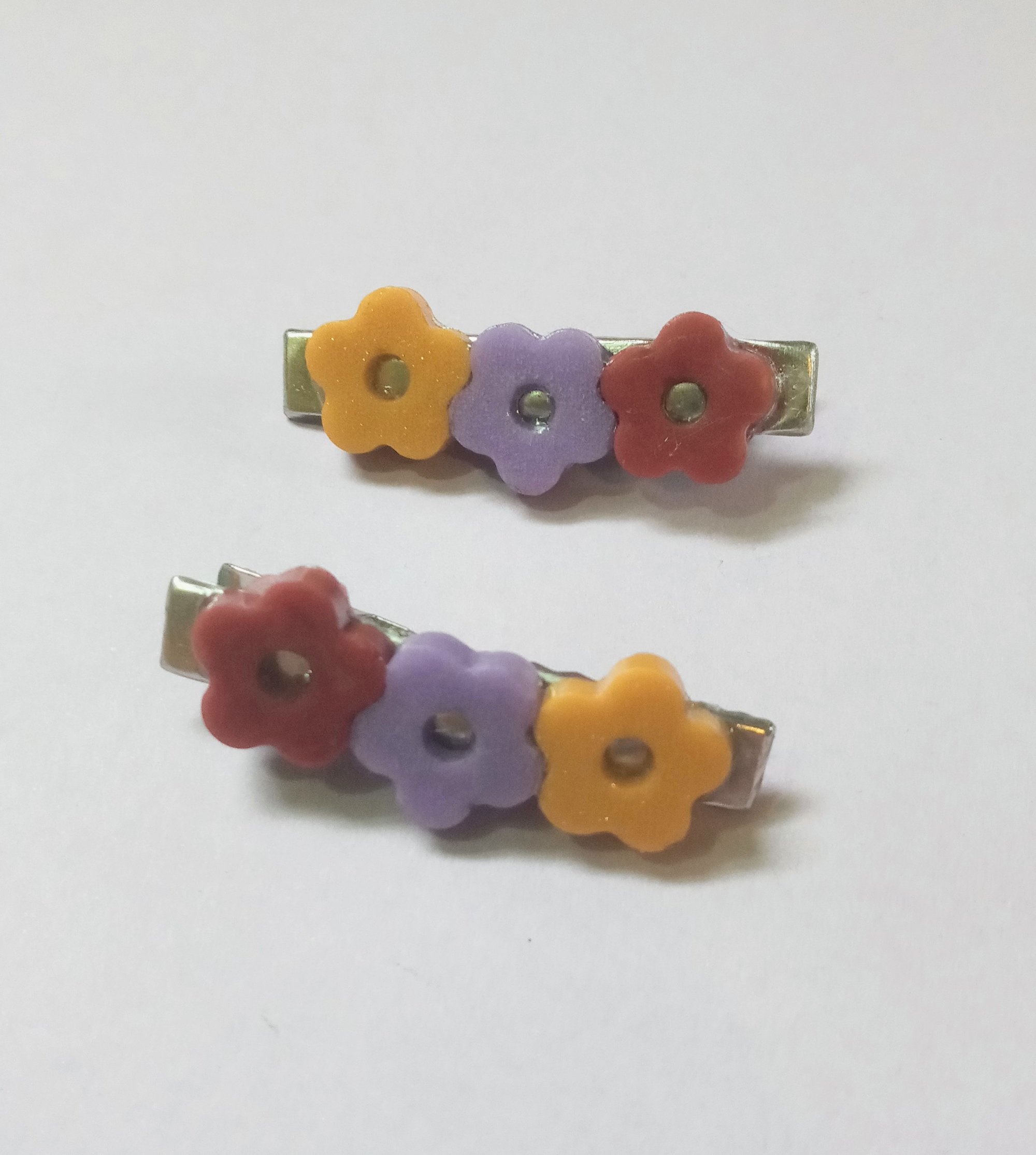 Image of flower jargon barettes