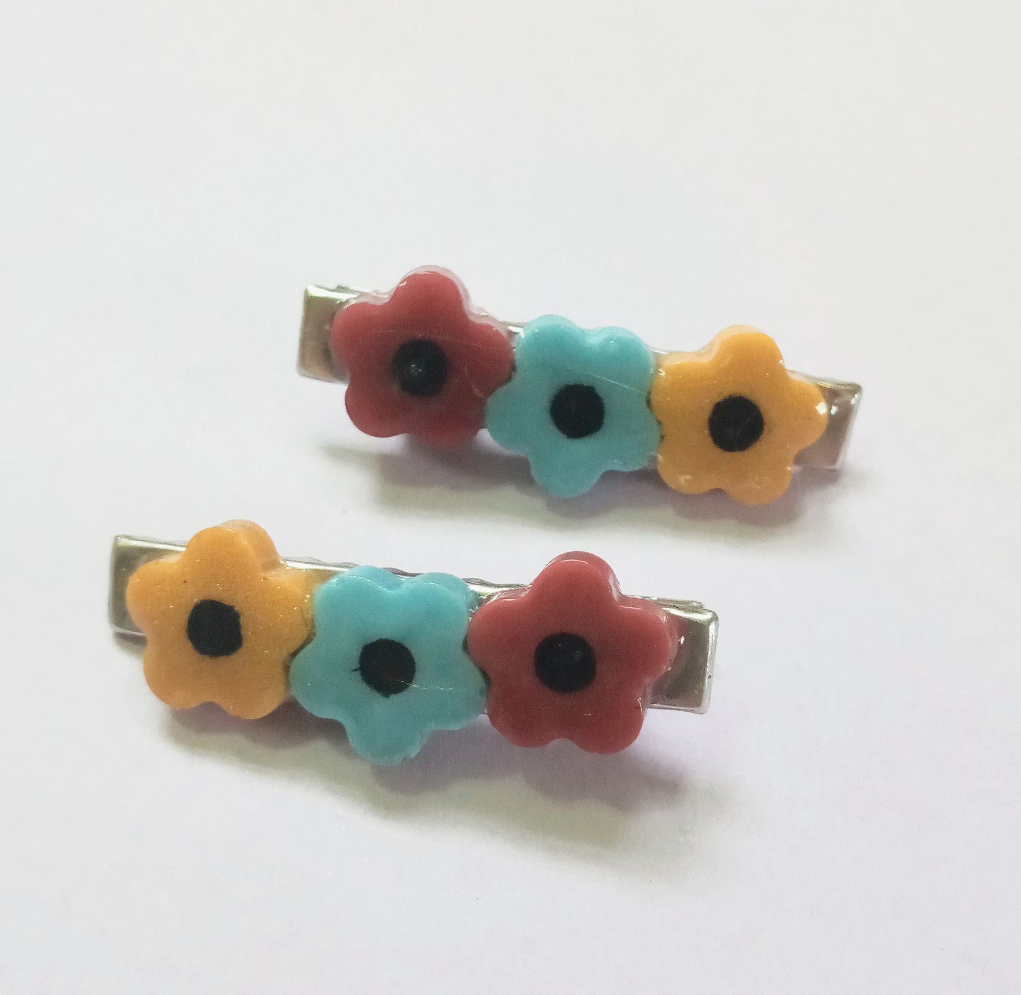 Image of flower jargon barettes