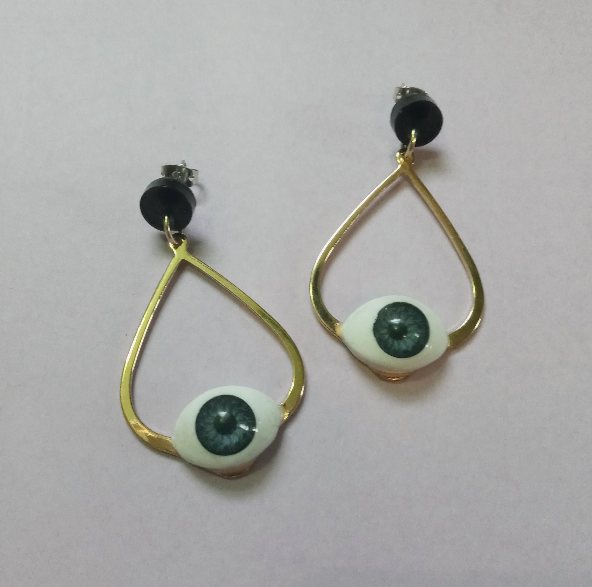 Image of eye drip earrings