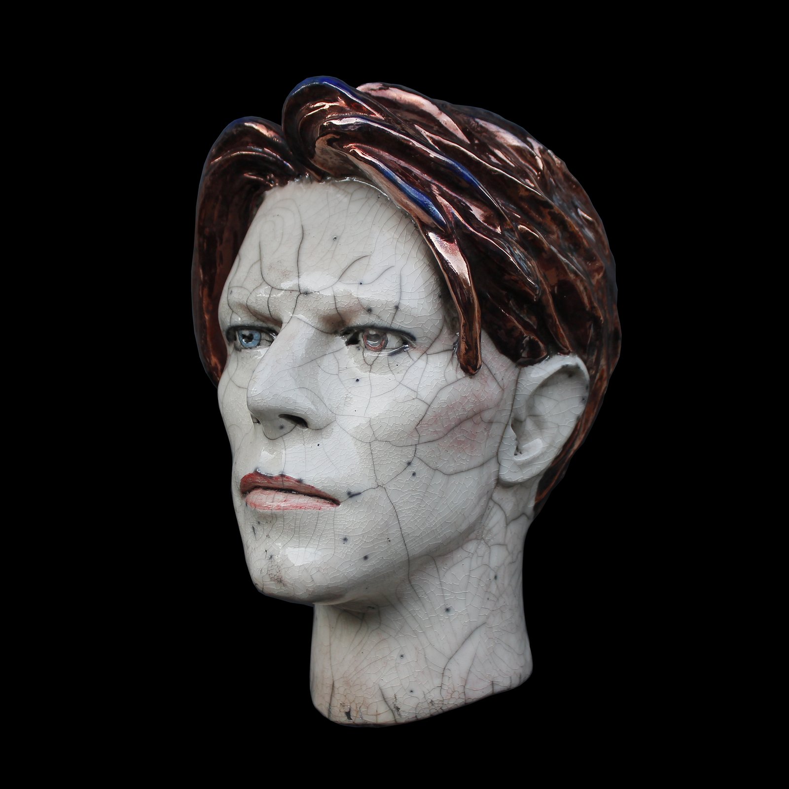 Ceramic sculpture of male head. Height: cheapest 11 1/2 in. Length: 6 in. Width: 6 in.