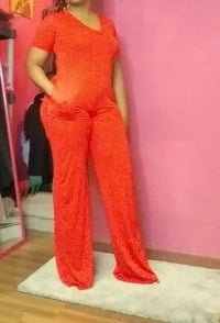 Image 4 of RED SHORT SLEEVE OVERSIZED  LEG JUMPSUIT 