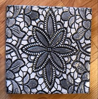 Image 1 of Black and white medallion lace wall tile - square