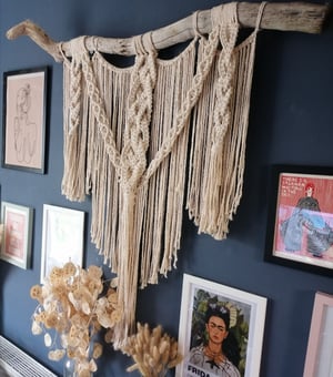 Large braided macrame on driftwood 