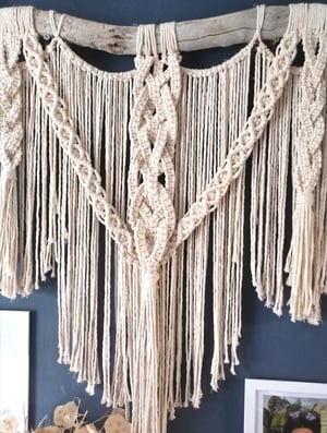 Large braided macrame on driftwood 