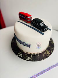 Image 1 of London themed cake topper with London bus, iconic London taxi 