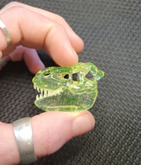 Image 2 of Illuminati and crushed opal Tyrannosaurus rex skull pendant. (UV reactive)