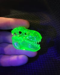 Image 3 of Illuminati and crushed opal Tyrannosaurus rex skull pendant. (UV reactive)