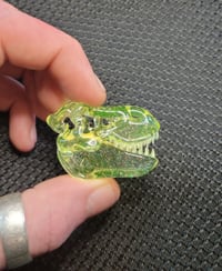 Image 4 of Illuminati and crushed opal Tyrannosaurus rex skull pendant. (UV reactive)