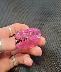 Image 1 of Karmaline Tyrannosaurus rex skull pendant.